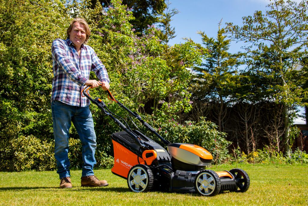 david-green-fingers (1) David mowing the lawn.